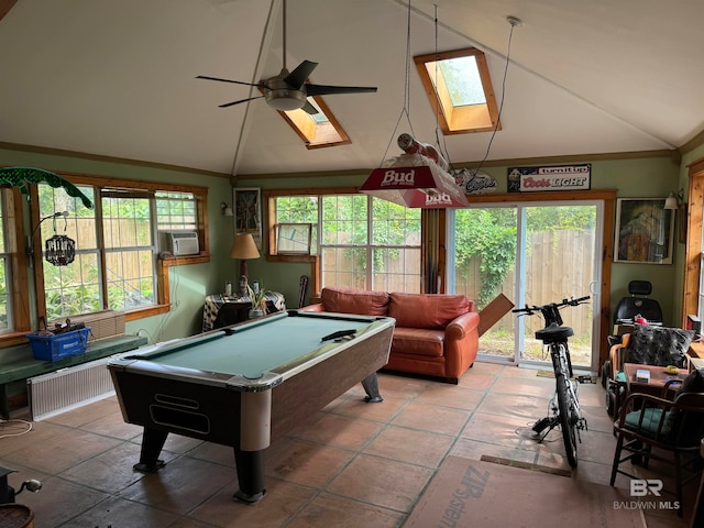 rec room with ceiling fan, lofted ceiling with skylight, a wealth of natural light, and pool table