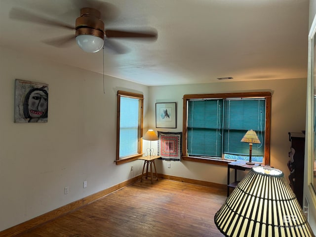 unfurnished room featuring wood-type flooring and ceiling fan