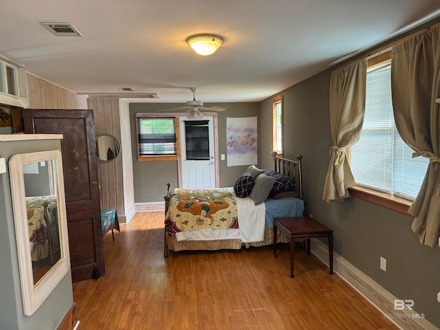 bedroom featuring ceiling fan and light hardwood / wood-style floors