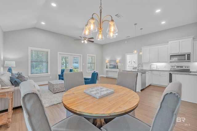 5774 Ono Ave, Pensacola, FL 32507 - dining space with recessed lighting, light wood finished floors, a ceiling fan, vaulted ceiling, and french doors