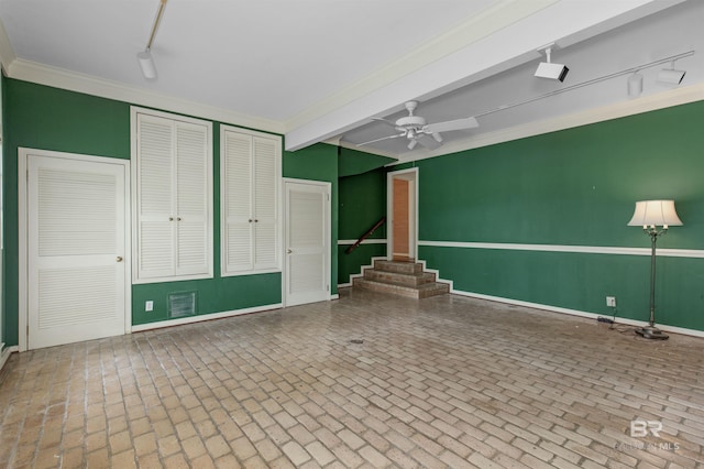 52 N Hawthorne Pl, Mobile, AL 36608 - empty room featuring ornamental molding, brick patterned flooring, rail lighting, and baseboards