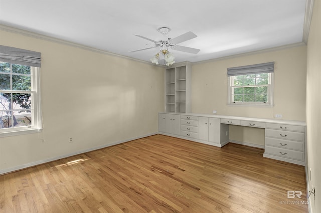 52 N Hawthorne Pl, Mobile, AL 36608 - unfurnished bedroom featuring crown molding, light wood-type flooring, baseboards, and ceiling fan