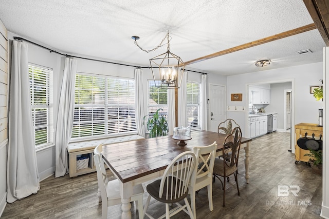 117 Richmond Rd, Daphne, AL 36526 - dining area featuring a textured ceiling, wood finished floors, a chandelier, and healthy amount of natural light
