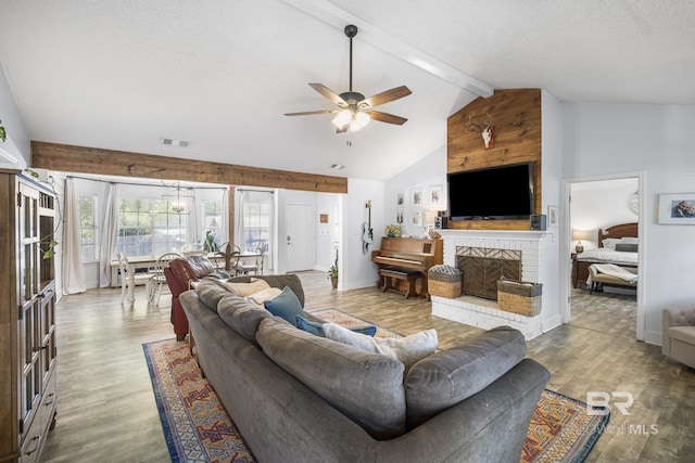117 Richmond Rd, Daphne, AL 36526 - living room featuring ceiling fan, wood finished floors, a brick fireplace, and baseboards
