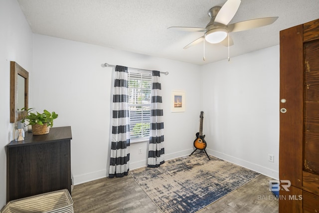 117 Richmond Rd, Daphne, AL 36526 - spare room with wood finished floors, a ceiling fan, baseboards, and a textured ceiling