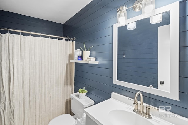 117 Richmond Rd, Daphne, AL 36526 - bathroom featuring toilet, wooden walls, vanity, and a shower with curtain