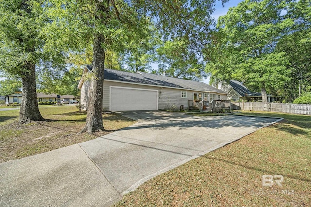117 Richmond Rd, Daphne, AL 36526 - view of side of property featuring concrete driveway, a wooden deck, and a garage
