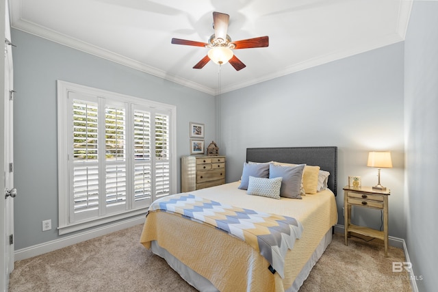 bedroom featuring ceiling fan, ornamental molding, and light carpet