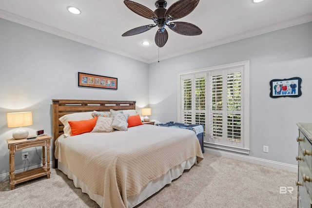 bedroom featuring light carpet, ceiling fan, and ornamental molding