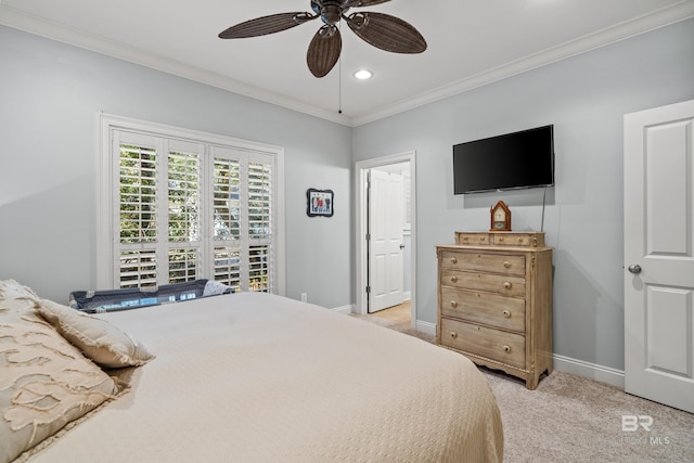 bedroom with light carpet, ceiling fan, and crown molding