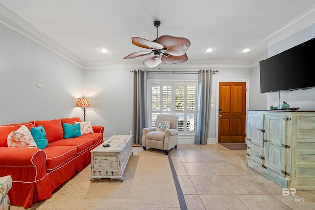 tiled living room with ceiling fan and ornamental molding