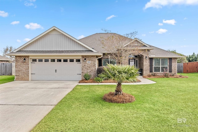 view of front facade featuring a garage and a front yard