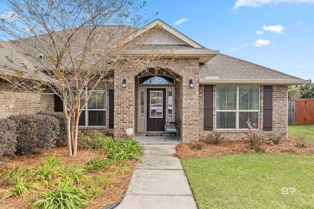 view of front of home with a front lawn