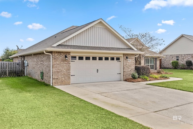 view of front facade with a garage and a front lawn