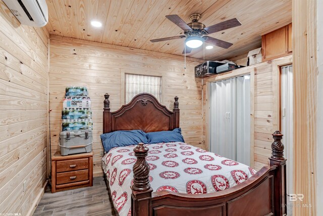 9005 Tuscaloosa Dr, Perdido Beach, AL 36530 - bedroom featuring wood walls, a wall mounted AC, and wood ceiling