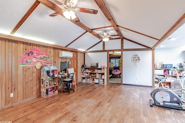 9005 Tuscaloosa Dr, Perdido Beach, AL 36530 - office space with baseboards, an AC wall unit, ceiling fan, wood walls, and hardwood / wood-style floors