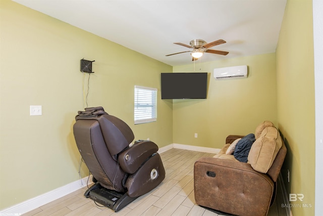 9005 Tuscaloosa Dr, Perdido Beach, AL 36530 - living area featuring a wall mounted air conditioner, baseboards, a ceiling fan, and wood finish floors