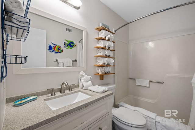 full bathroom featuring toilet, vanity, and shower / tub combo with curtain