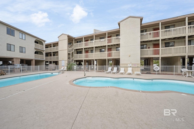 view of pool with a patio