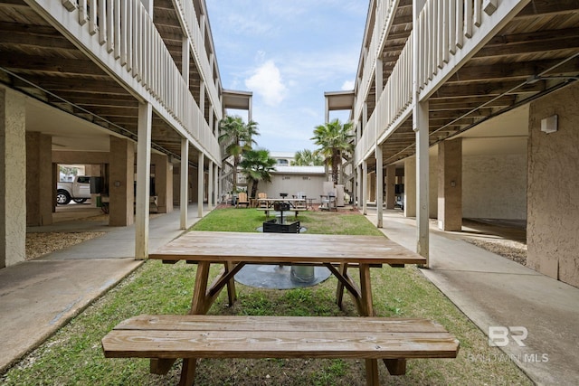 surrounding community featuring a patio