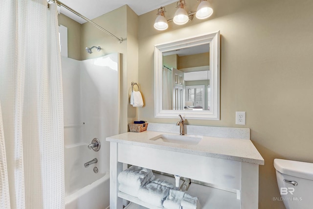 full bathroom with toilet, vanity, and shower / bathtub combination with curtain