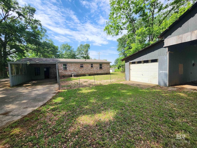 view of yard with a garage