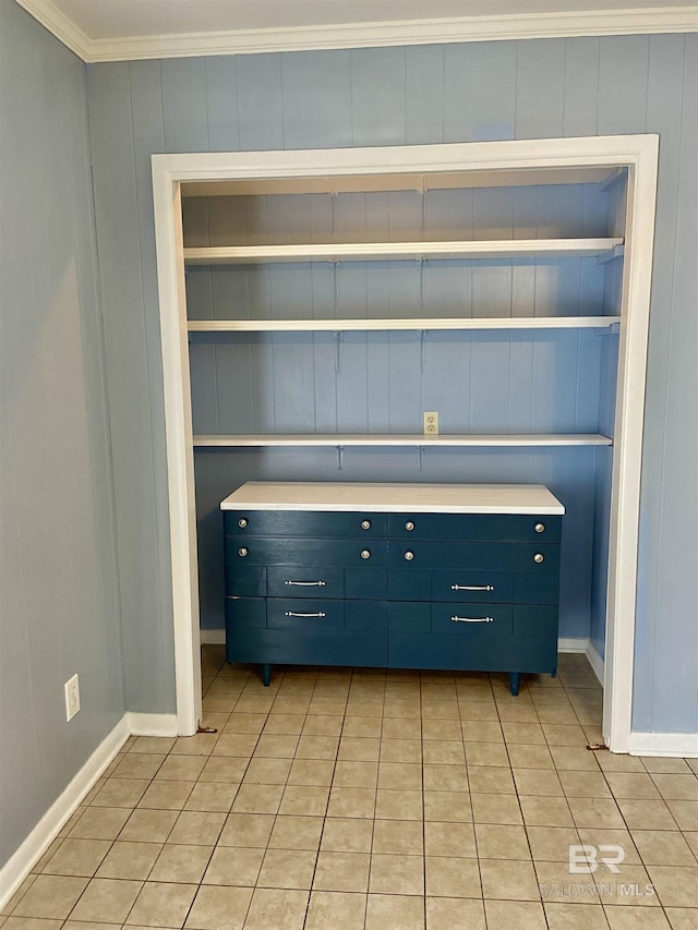 interior space featuring crown molding and built in features