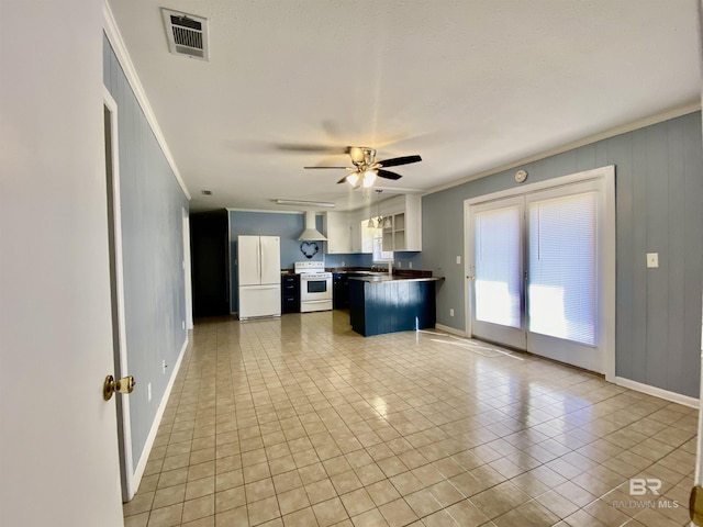 kitchen with ornamental molding, white appliances, dark countertops, and visible vents