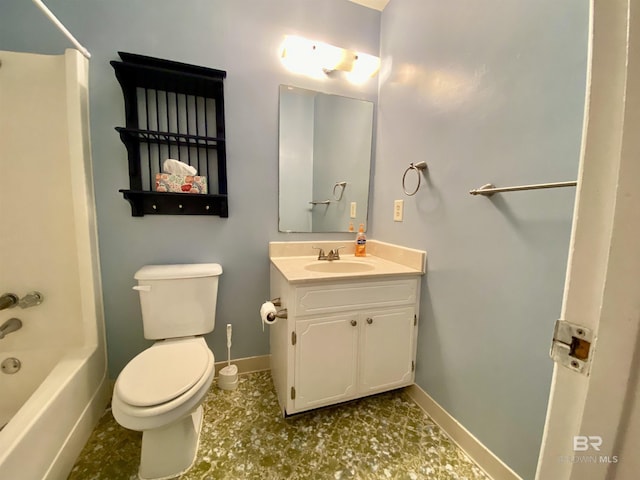 bathroom with vanity, toilet, baseboards, and bathtub / shower combination