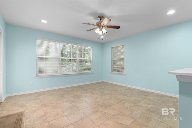 5645 Green Tree Rd, Mobile, AL 36609 - empty room featuring a ceiling fan, recessed lighting, and baseboards