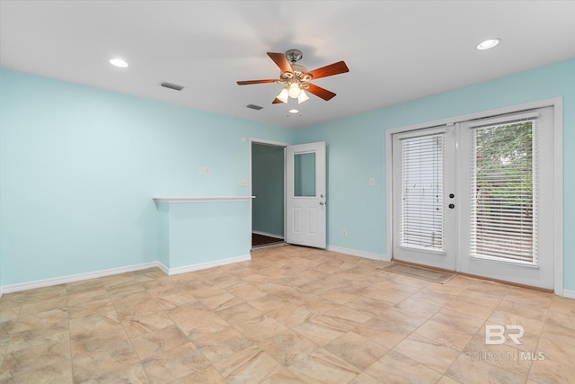 5645 Green Tree Rd, Mobile, AL 36609 - spare room with a ceiling fan, baseboards, french doors, and recessed lighting