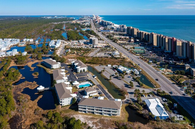 birds eye view of property featuring a water view