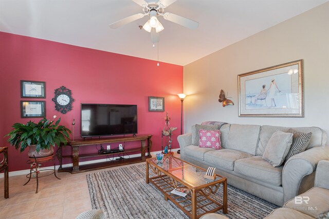 tiled living room featuring ceiling fan