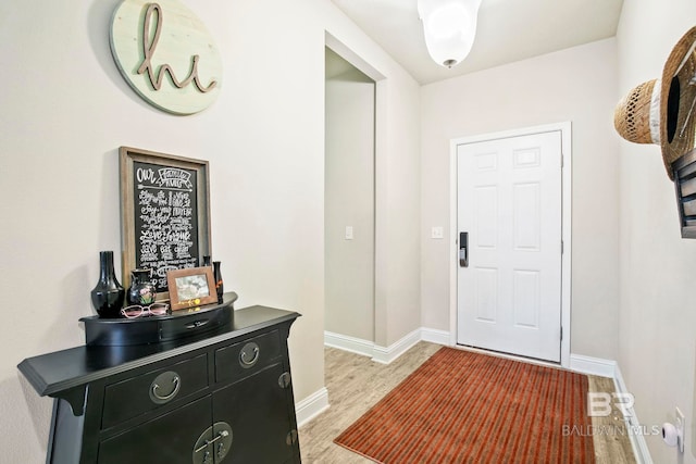 entrance foyer with light hardwood / wood-style floors