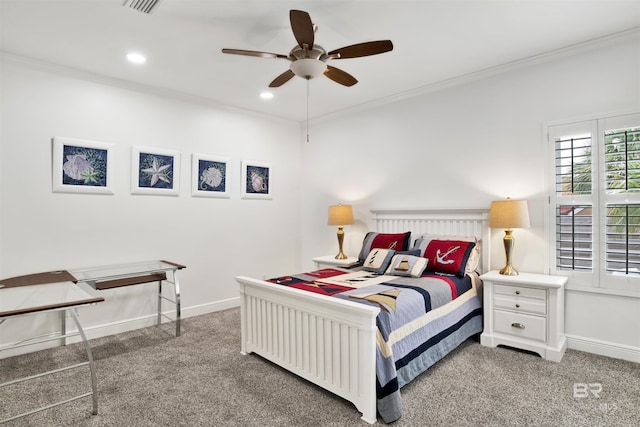 carpeted bedroom featuring ceiling fan and ornamental molding