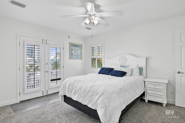 bedroom featuring ceiling fan, access to exterior, crown molding, and french doors