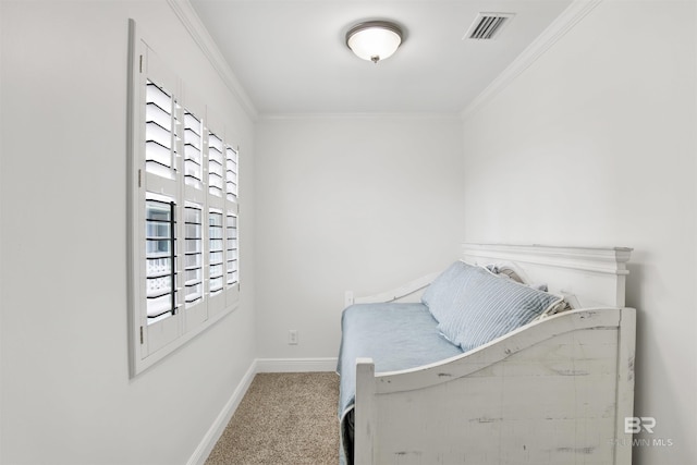 bedroom with carpet flooring and ornamental molding