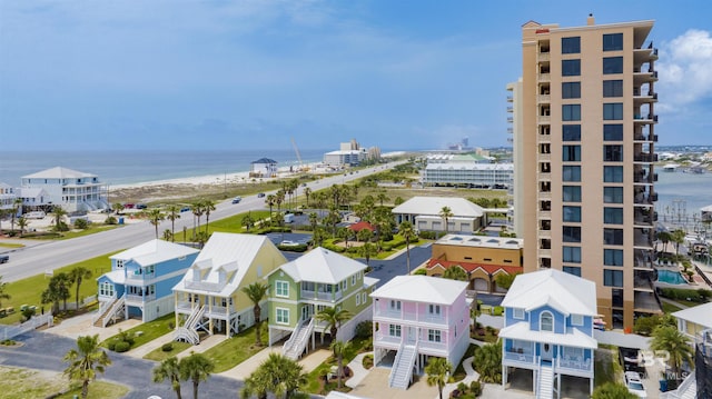 aerial view featuring a water view and a view of the beach