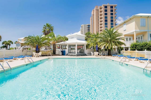 view of pool with a gazebo and a patio