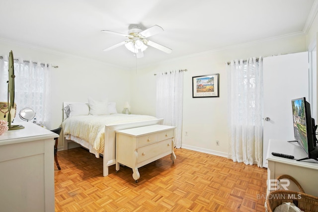 bedroom featuring ceiling fan, ornamental molding, and light parquet flooring