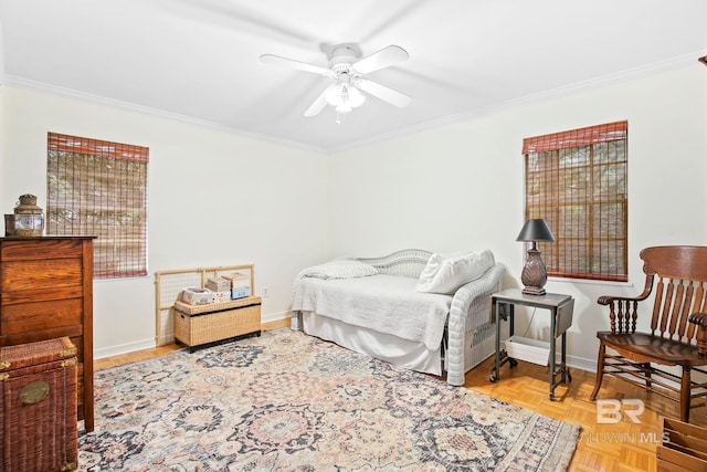 bedroom with ceiling fan, parquet floors, and crown molding