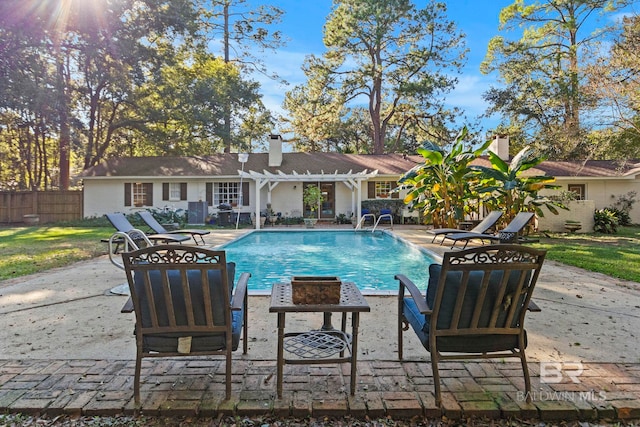 view of swimming pool featuring a patio