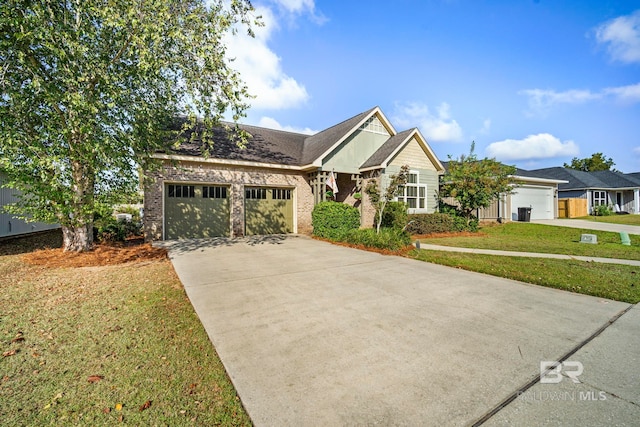 craftsman inspired home with a front yard and a garage