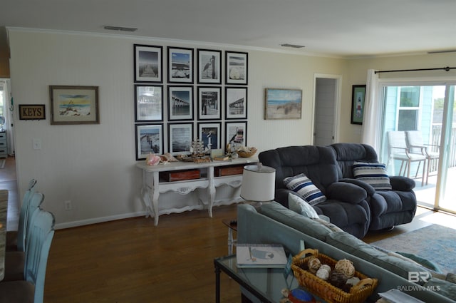 220 Shoreland Cir, Gulf Shores, AL 36542 - living room with dark hardwood / wood-style floors and crown molding