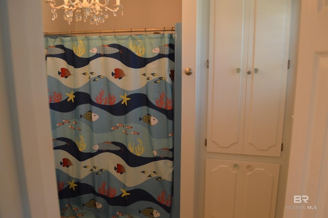 220 Shoreland Cir, Gulf Shores, AL 36542 - bathroom with curtained shower
