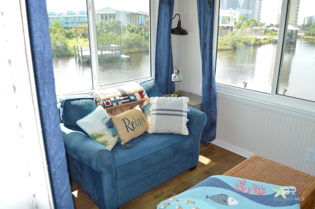 220 Shoreland Cir, Gulf Shores, AL 36542 - living area with dark hardwood / wood-style flooring and a water view