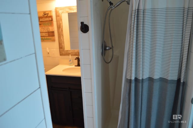220 Shoreland Cir, Gulf Shores, AL 36542 - bathroom with a shower with shower curtain and vanity