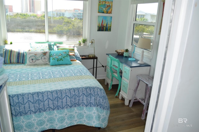 220 Shoreland Cir, Gulf Shores, AL 36542 - bedroom with a water view and hardwood / wood-style flooring