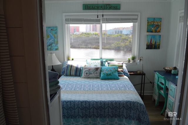 220 Shoreland Cir, Gulf Shores, AL 36542 - bedroom featuring wood-type flooring and a water view