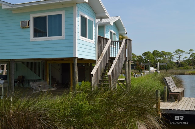 220 Shoreland Cir, Gulf Shores, AL 36542 - view of home's exterior featuring a water view